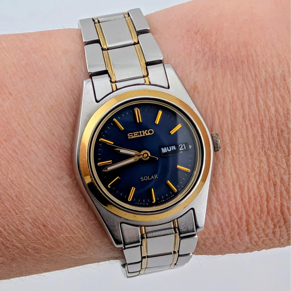 Seiko Solar V138-0AA0 Blue Sunburst Day/Date Two Tone Women's 25mm Watch